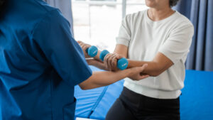 patient in Waxahachie receiving physical therapy assistance