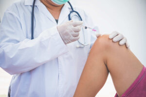 Doctor administering Facet Injections at Eclipse Clinic